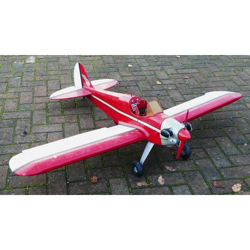 314 - A remote control model plane, Irvine engine with Futaba S3003 servos, red and white livery, 150cm wi... 