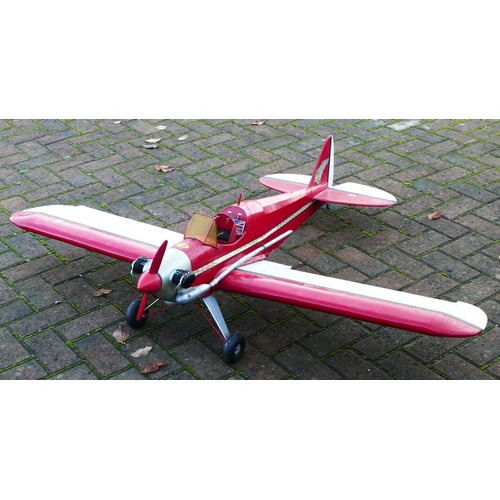 314 - A remote control model plane, Irvine engine with Futaba S3003 servos, red and white livery, 150cm wi... 