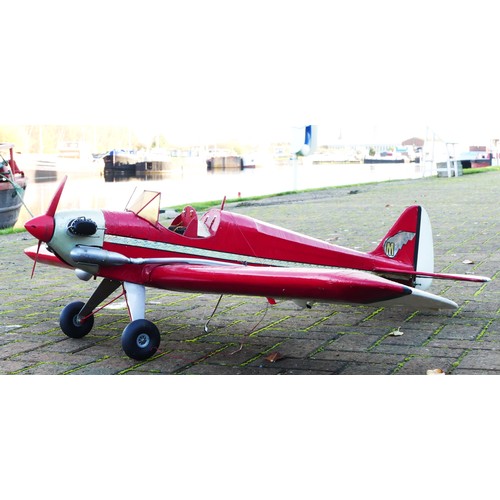 314 - A remote control model plane, Irvine engine with Futaba S3003 servos, red and white livery, 150cm wi... 