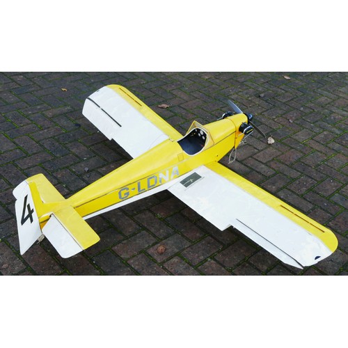 317 - A remote control model plane, unknown engine, yellow and white livery, G-LDNA and 4 decal, 155cm win... 