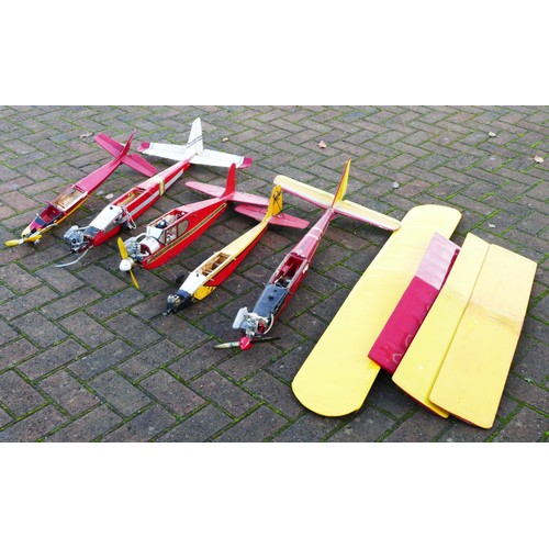 319 - Five part built remote control model planes, all with engines, three with servos, together with four... 