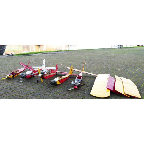 319 - Five part built remote control model planes, all with engines, three with servos, together with four... 