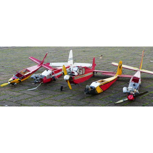 319 - Five part built remote control model planes, all with engines, three with servos, together with four... 