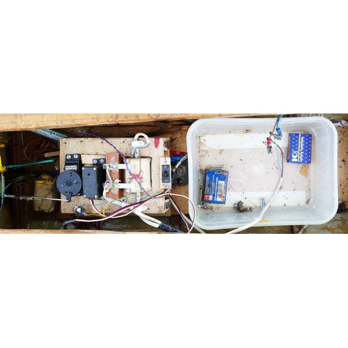 321 - A remote controlled tugboat / fishing boat, complete with propellers and servos, red, white and blac... 