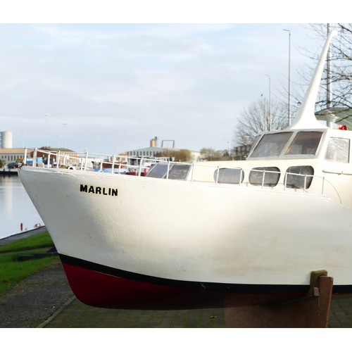 324 - A remote control cruiser/luxury yacht, complete with propeller and servos, white livery with Marlin ... 