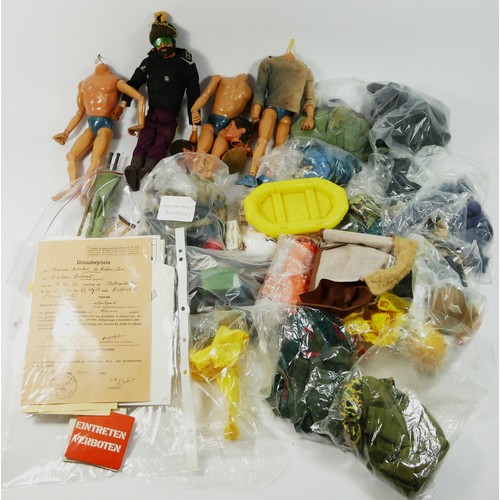 325 - Three Action Men figures, with another figure (no head), with documents and manuals, also including ... 