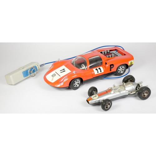 330 - A Schuho 1071 Lotus Formel 1 windup car, together with a Gama Rallye Porsche Carrera 10 (2)