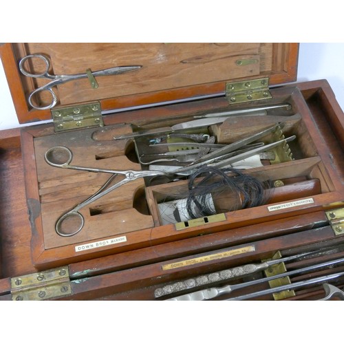 338 - A set of Down Bros, London surgeons amputation tools, including saw, knifes, clippers, pinchers and ... 