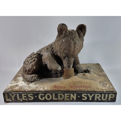 347 - Lyle's Golden Syrup, bears inspection, a plaster shop display model, c.1930's, of a brown bear eatin... 