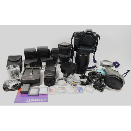 354 - A Canon D30 DSLR camera, together with a a Sigma 28mm-135mm f3.8-f5.6 lens, a Sigma 70mm-300mm f4-f5... 