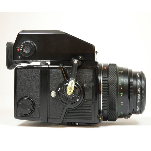 356 - A Bronica ETRsi medium format camera, original box and manual, together with a 75mm f2.8 lens, a 150... 