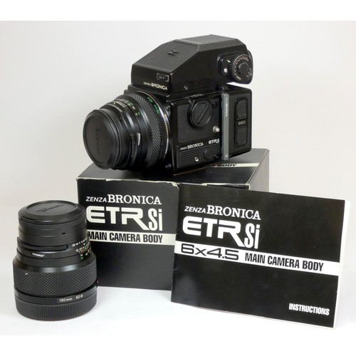 356 - A Bronica ETRsi medium format camera, original box and manual, together with a 75mm f2.8 lens, a 150... 