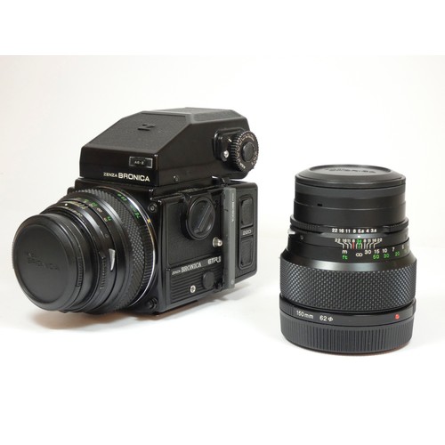 356 - A Bronica ETRsi medium format camera, original box and manual, together with a 75mm f2.8 lens, a 150... 