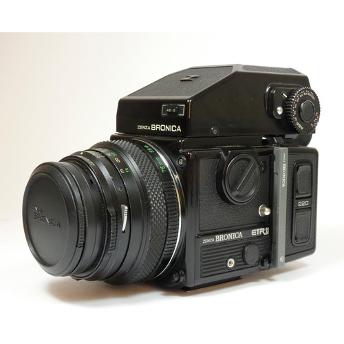 356 - A Bronica ETRsi medium format camera, original box and manual, together with a 75mm f2.8 lens, a 150... 