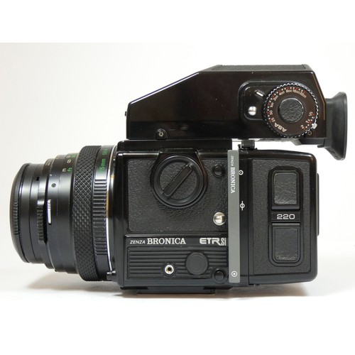 356 - A Bronica ETRsi medium format camera, original box and manual, together with a 75mm f2.8 lens, a 150... 