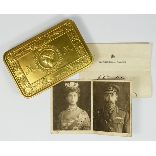 381 - A WWI brass Christmas 1914 tin, with original card and letter