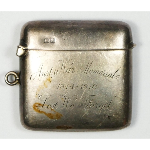 387 - Of Ansty War Memorial interest; a silver vesta case, Chester 1918, inscribed 