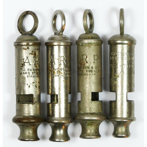 395 - WWII, three ARP Hudson whistles and a military Hudson whistle, broad arrow, 973-7001 (4).