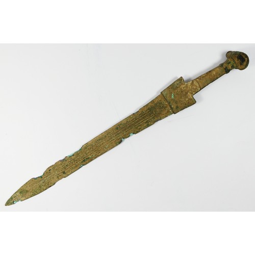 412 - A Luristan bronze short sword, with ribbed blade and stone set pommel, 46.5cm.
Provenance; purchased... 