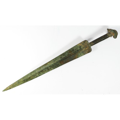 413 - A Luristan bronze short sword, with pronounced central ribbed blade and ear pommel, 47cm.
Provenance... 