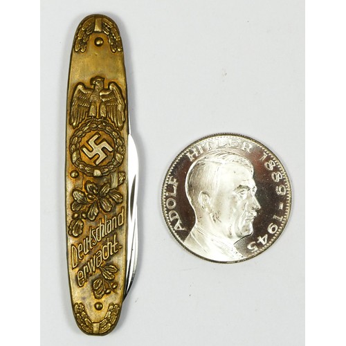 418 - A Drittes Reich Adolf Hitler penknife, the 65mm blade by Solingen, and a 1889-1945 Adolf Hitler coin... 