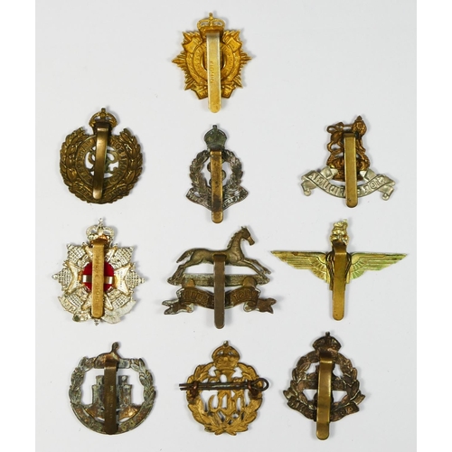 430 - Ten Military cap badges, to include Border Regiment and Parachute Regiment