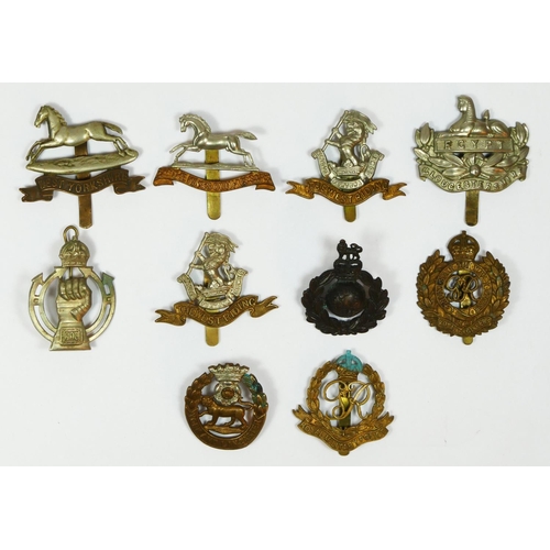 433 - Ten military cap badges, including the, Royal Armoured Corps, 3rd The Kings Own Hussars, and Royal M... 