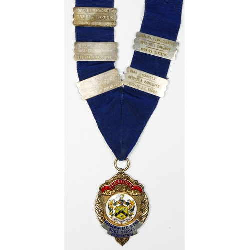 447 - Of Huddersfield and District Boot Trade Federation interest, a silver and enamel Presidents medal, s... 