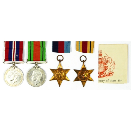 454 - Royal Armoured Corps, WWII group of four, 1939-1945 Star, Africa Star, Defence and War, unworn, boxe... 