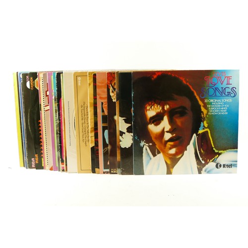 231 - Twenty four Elvis vinyl LPs, to include Hits Of The 70s. 40 Greatest Hits, Flaming Star, In Memphis,... 