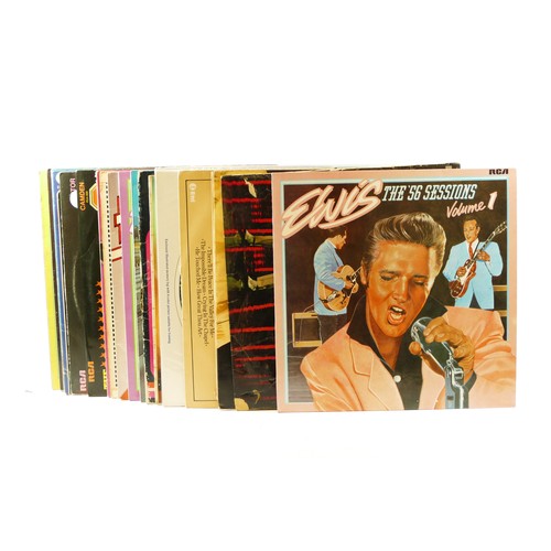 231 - Twenty four Elvis vinyl LPs, to include Hits Of The 70s. 40 Greatest Hits, Flaming Star, In Memphis,... 