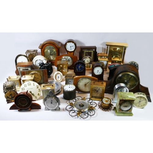 A collection of mantel clocks, makers to include Elliott, Smiths, Kundo, Westclox and others. (4)
