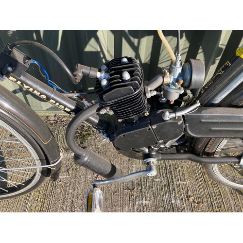 15 - A Flying Pigeon motorised bicycle, unregistered, with luggage rack, pannier and rear stand.
The Flyi... 