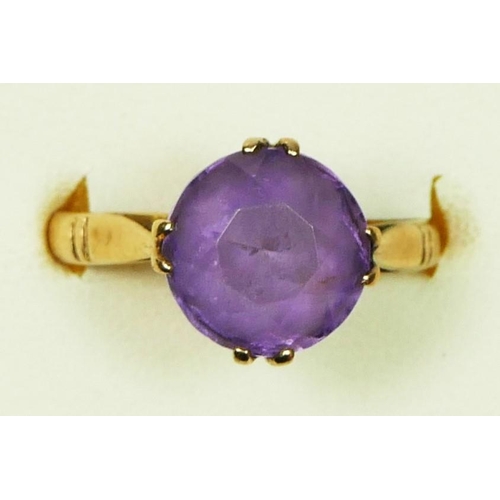 6 - A 9ct gold and amethyst dress ring, diameter 10mm, L, 3.2gm