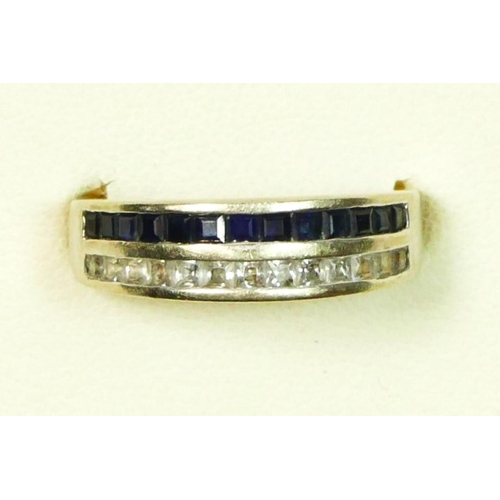 13 - A 585/14ct white gold square cut sapphire and Princess cut white stone ring, O 1/2, 4.4gm