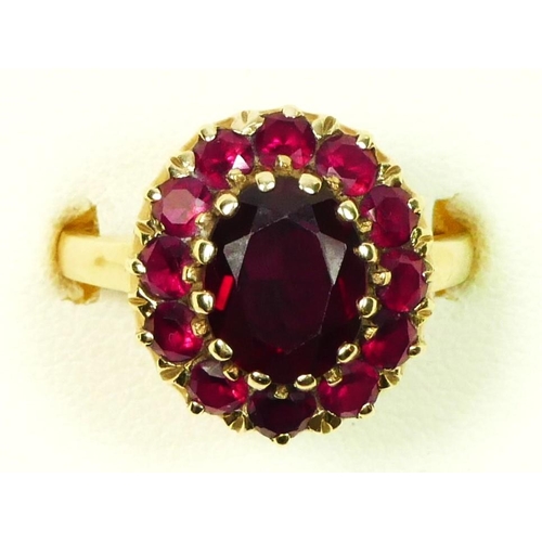 14 - A 10K synthetic ruby cluster ring, 15 x 14mm,R, 5.2gm