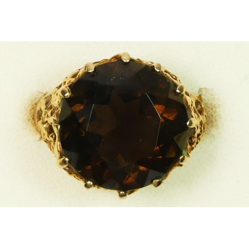 27 - A vintage 9ct gold smokey quartz dress ring, abstract pierced mount, H, 4.8gm