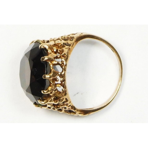 27 - A vintage 9ct gold smokey quartz dress ring, abstract pierced mount, H, 4.8gm