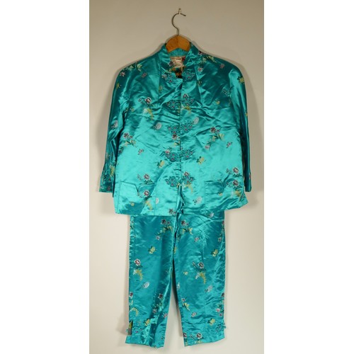 101 - Satin oriental outfits and cloth to include a Green short sleeved top, chest 47cm, with cropped pant... 