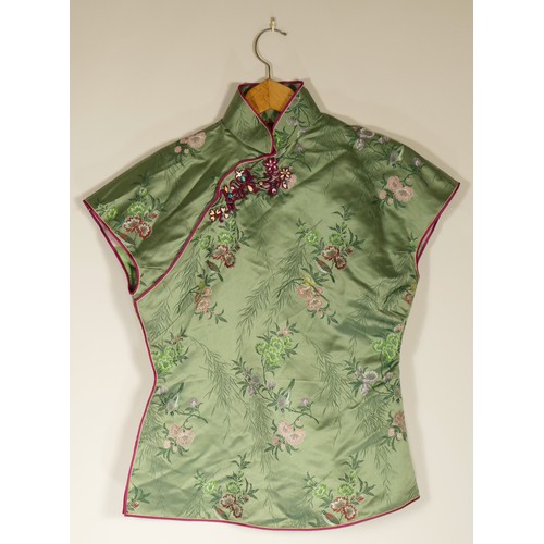 101 - Satin oriental outfits and cloth to include a Green short sleeved top, chest 47cm, with cropped pant... 