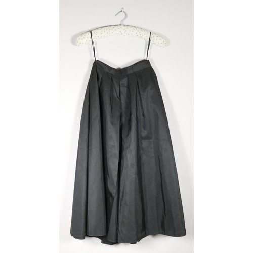 102 - A selection of skirts to include a 'Pherrada' black satin skirt, size 10, a long black crepe skirt, ... 