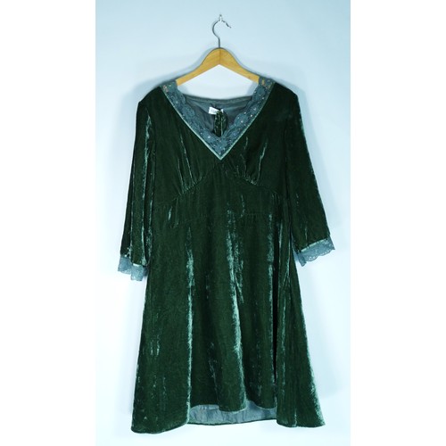 122 - A selection of clothing to include a 'Together' green crushed velvet dress v-neck lace detail with s... 