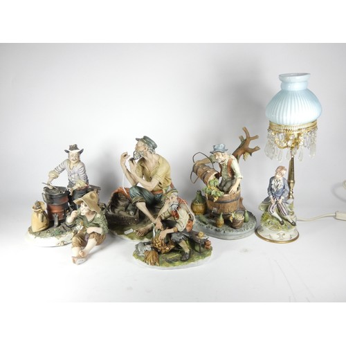 91 - A collection of ceramics, to include Goebel figurines, Capodimonte bisque figurines, Lladro model of... 