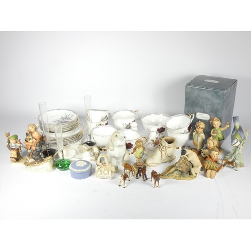 91 - A collection of ceramics, to include Goebel figurines, Capodimonte bisque figurines, Lladro model of... 