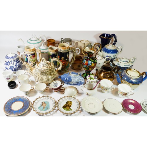 76 - A collection of early 20th century & later ceramic teapots, together with lidded steins and porcelai... 