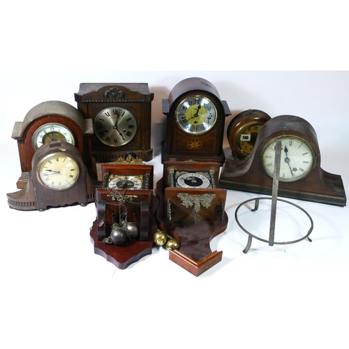 77 - A collection of mid 20th century mantel and wall clocks, manual wind and quartz movements for spares... 