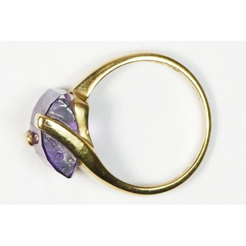 75 - A 9ct gold and facetted dome cut amethyst dress ring, k 1/2, 2.8gm