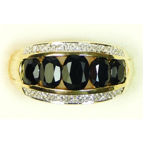 89 - A 9ct gold, graduated sapphire and diamond panel ring, P, 5.3gm