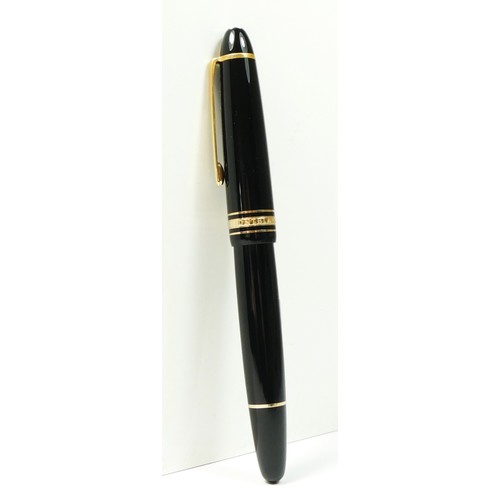 116 - Mont Blanc Meisterstuck, a black body and gold plated rollerball pen, c. 1996, clip ring number EK10... 