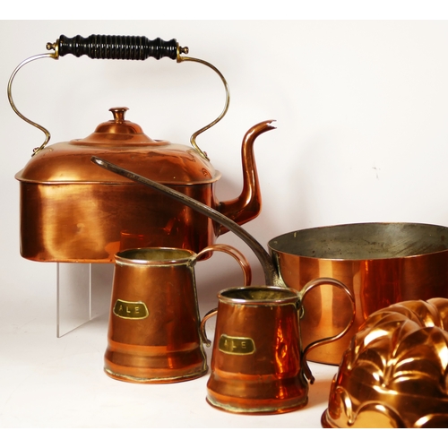 151 - A square copper kettle, three graduated jugs , a saucepan, a pan and a jelly mould